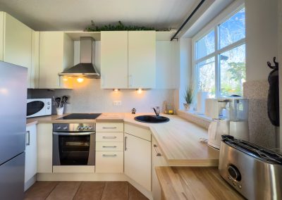 Große, voll ausgestattete Küche in unserem Ferienhaus auf Fehmarn